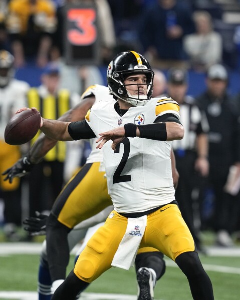 Pittsburgh Steelers quarterback Mason Rudolph looks for a receiver during the second half of the team's NFL football game against the Indianapolis Colts in Indianapolis on Saturday, Dec. 16, 2023. The Colts won 30-13. (AP Photo/Darron Cummings)