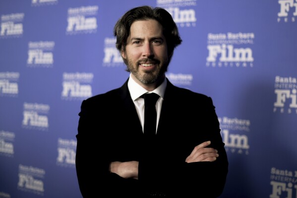 FILE - Jason Reitman attends the 2018 Kirk Douglas Award for Excellence in Film Honoring Hugh Jackman at the Ritz-Carlton Bacara, Nov. 19, 2018, in Goleta, Calif. Reitman along with more than 30 directors, including Steven Spielberg, Christopher Nolan and Bradley Cooper acquired Westwood's Village Theater, the group announced Wednesday, Feb. 21, 2024. (Photo by Richard Shotwell/Invision/AP, File)