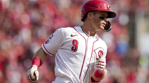 Cincinnati Reds' Matt McLain runs the bases after hitting a solo home run during the sixth inning of a baseball game against the Arizona Diamondbacks in Cincinnati, Saturday, July 22, 2023. (AP Photo/Aaron Doster)