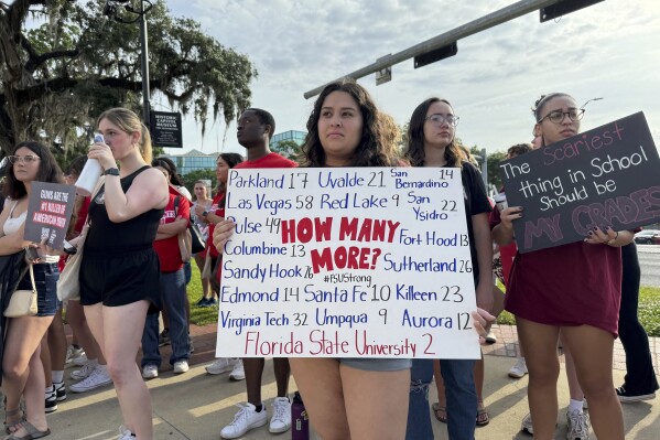 Students and activists rally for gun control policies outside of Florida's historic old capitol on Wednesday, April 23, 2025 in Tallahassee, Fla., less than a week after a deadly shooting at Florida State University. (AP Photo/Kate Payne)