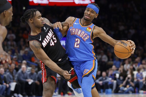 Gilgeous-Alexander scores 32, and the Thunder rally from 21 down to beat Heat 115-101 | AP News