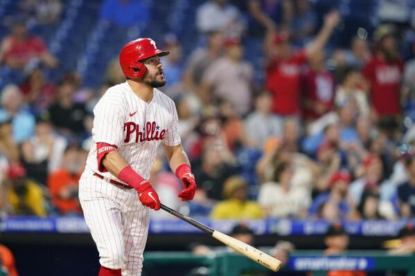 Philadelphia Phillies' Nick Maton is congratulated in the dugout after  hitting a two-run home run during the seventh inning of a baseball game  against the Miami Marlins, Tuesday, Sept. 13, 2022, in