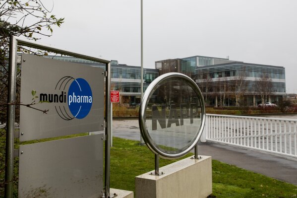 This Dec. 12, 2019, photo shows a sign at the Mundipharma International headquarters at Cambridge Science Park in England. Mundipharma is the international affiliate of Purdue Pharma, the maker of the blockbuster painkiller OxyContin. Mundipharma is now marketing Nyxoid, a new brand of naloxone, an opioid overdose reversal medication. (AP Photo/Leila Coker)