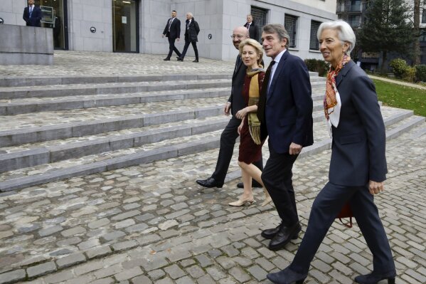 From left, European Council President Charles Michel, European Commission President Ursula von der Leyen, European Parliament President Sassoli and European Central Bank President Christine Lagarde arrive for an event at the House of European History in Brussels, Sunday, Dec. 1, 2019. European institution leaders on Sunday marked the 10th anniversary of the entry into force of the Lisbon Treaty(AP Photo/Olivier Matthys)