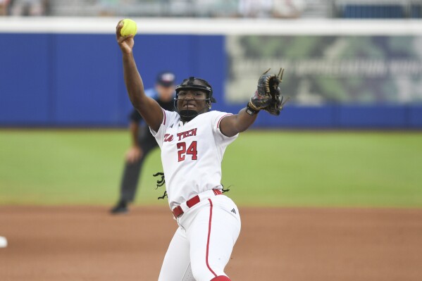 Texas Tech pitcher NiJaree Canady throws during the second game of the NCAA softball Women's College World Series finals against Texas in Oklahoma City, Thursday, June 5, 2025. (AP Photo/Kyle Phillips)