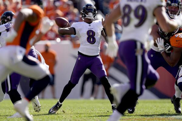 Baltimore Ravens linebacker Odafe Oweh (99) celebrates his sack against the  Denver Broncos during the first half of an NFL football game, Sunday, Oct.  3, 2021, in Denver. (AP Photo/David Zalubowski Stock