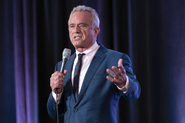 FILE - Independent presidential candidate Robert F. Kennedy Jr. speaks during the Libertarian National Convention in Washington, May 24, 2024. With early voting set to begin in late September in some states, there are signs that groups are trying to affect the outcome by using deceptive means. In most cases, in ways that would benefit Donald Trump by whittling away President Joe Biden’s already tepid standing with the Democratic Party’s base by offering left-leaning, third-party alternatives. Libertarians in Colorado want to put Kennedy Jr. on the ballot to create "chaos.” (AP Photo/Jose Luis Magana, File)