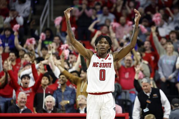 North Carolina State's Terquavion Smith celebrates making a three-point shot during the second half of an NCAA college basketball game against Duke in Raleigh, N.C., Wednesday, Jan. 4, 2023. (AP Photo/Karl B DeBlaker)