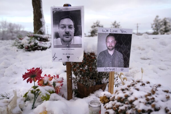 FILE - Pictures of two of the victims of the October 2023 mass shooting by Army reservist Robert Card are seen at a makeshift memorial in Lewiston, Maine, Dec. 5, 2023.  (AP Photo/Robert F. Bukaty, File)