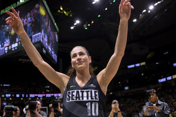 Seattle Storm guard Sue Bird (10) waves to fans chanting her name after the Storm lost to the Las Vegas Aces and were eliminated from the playoffs, in Game 4 of a WNBA basketball semifinal Tuesday, Sept. 6, 2022, in Seattle. The Aces won 97-92. (AP Photo/Lindsey Wasson)