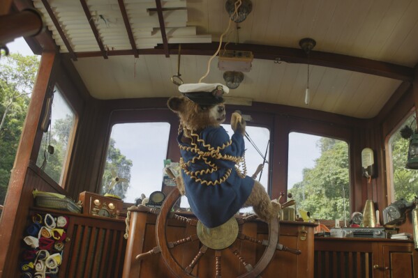 This image released by Sony Pictures shows the character Paddington, voiced by Ben Whishaw, in a scene from "Paddington in Peru." (Sony Pictures via AP)