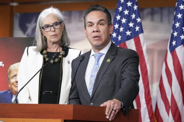 Rep. Pete Aguilar, D-Calif., right, speaks as Rep. Katherine Clark, D-Mass., left, listens during a news conference Wednesday, May 24, 2023, on Capitol Hill in Washington. (AP Photo/Mariam Zuhaib)