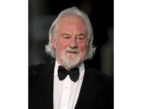Actor Bernard Hill arrives for the U.K. Premiere of "The Hobbit: An Unexpected Journey" at the Odeon Leicester Square, in London, Dec. 12, 2012. Hill, who delivered a rousing battle cry before leading his people into battle in “The Lord of the Rings: The Return of the King" and went down with the ship as captain in “Titanic,” has died. Hill, 79, died Sunday morning, May 5, 2024, agent Lou Coulson said. (Dominic Lipinski/PA via AP)