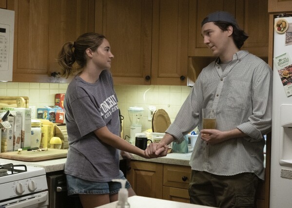 This image released by Sony Pictures shows Shailene Woodley, left, and Paul Dano in a scene from "Dumb Money." (Claire Folger/Sony Pictures via AP)