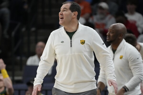 Baylor head coach Scott Drew yells to his players during the first half of a first-round college basketball game against the Colgate in the NCAA Tournament, Friday, March 22, 2024, in Memphis, Tenn. (AP Photo/George Walker IV)