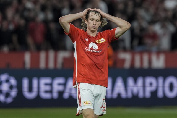 Union's Alex Kral reacts during the UEFA Champions League Group C soccer match between Union Berlin and SC Braga in Berlin on Tuesday, Oct. 3, 2023. (AP Photo/Markus Schreiber)