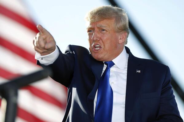 FILE - Former President Donald Trump speaks at a rally at the Delaware County Fairgrounds, April 23, 2022, in Delaware, Ohio. Former President Donald Trump has paid the $110,000 in fines on Thursday, May 19, 2022, that he racked up after being held in contempt of court for being slow to respond to a civil subpoena issued by New York's attorney general Letitia James. (AP Photo/Joe Maiorana, File)