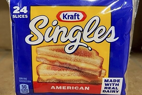 This image provided by Kraft Heinz shows a 24-pack of American cheese slices. Kraft Heinz said Tuesday, Sept. 20, 2023 it's recalling more than 83,000 cases of individually-wrapped Kraft Singles American processed cheese slices because part of the wrapper could stick to the slice and become a choking hazard. (Kraft Heinz via AP)