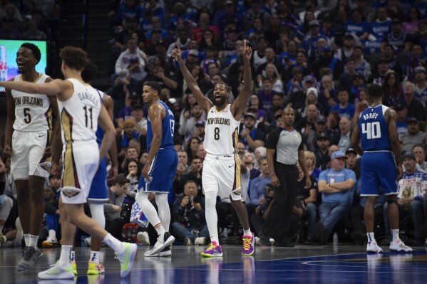 New Orleans Pelicans forward Naji Marshall (8) walks off the floor after scoring during the first quarter of an NBA basketball game against the Sacramento Kings in Sacramento, Calif., Monday, Dec. 4, 2023. (AP Photo/José Luis Villegas)