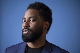 
              In this Nov. 14, 2018 photo, actor John David Washington, star of "BlacKkKlansman," poses for a portrait at the Four Seasons Hotel in Los Angeles. Washington has been named as a Breakthrough Entertainer of the Year by the Associated Press. (Photo by Rebecca Cabage/Invision/AP)
            
