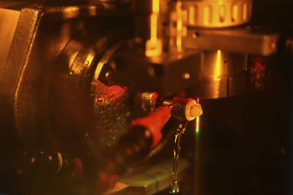 A diamond is cut at Shree Ramkrishna Exports in Surat, India, on April 14, 2025. (AP Photo/Ajit Solanki)