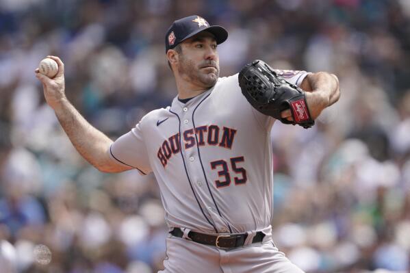 Houston Astros starting pitcher Justin Verlander throws against the Seattle Mariners during the first inning of a baseball game, Saturday, July 23, 2022, in Seattle. (AP Photo/Ted S. Warren)