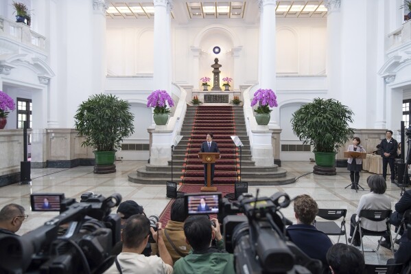 In this photo released by the Taiwan Presidential Office, Taiwan's President Lai Ching-te speaks at a press conference after a security meeting about U.S. President Trump's tariffs on trade partners and semiconductors at the Presidential office in Taipei, Friday, Feb. 14, 2025. (Taiwan Presidential Office via AP)