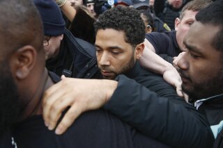 
              FILE - In this Feb. 21, 2019 file photo, "Empire" actor Jussie Smollett leaves Cook County jail following his release in Chicago. A Cook County grand jury on Friday, March 8, 2019 has indicted Smollett on 16 felony charges after authorities say he falsely told police that he was attacked by two men in Chicago. (AP Photo/Kamil Krzaczynski, File)
            