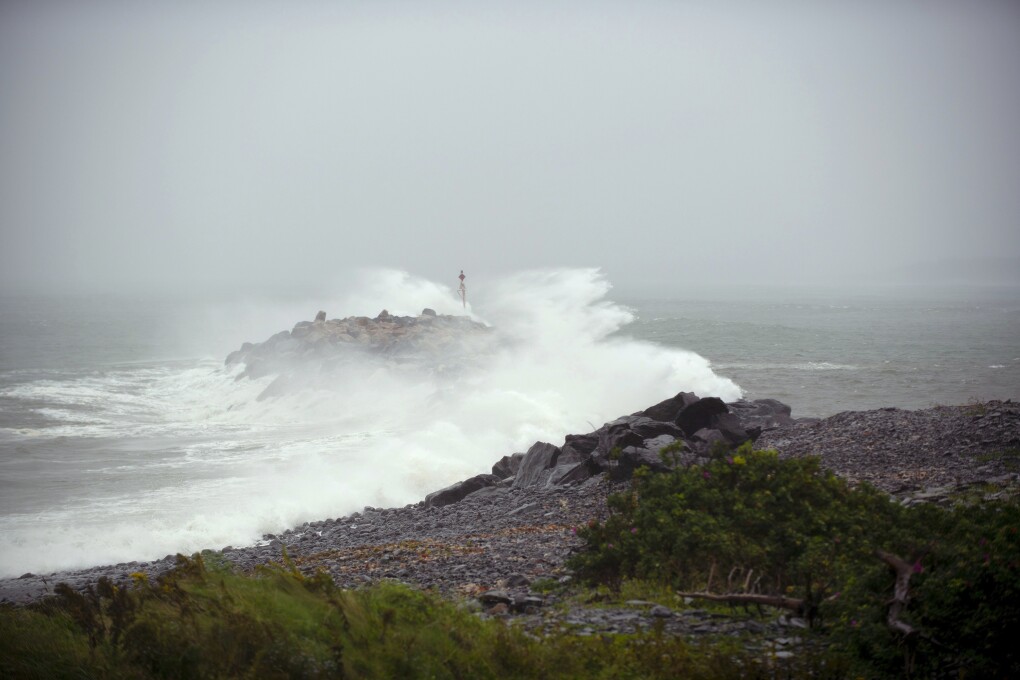 Waves crash against a breakwater in Port Maitland, Nova Scotia, Canada, as post-tropical cyclone Lee approaches on Saturday, Sept. 16, 2023. (Bill Curry/The Canadian Press via AP)