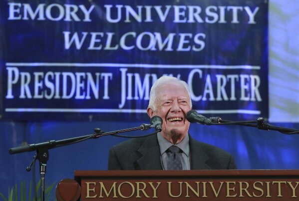 
              Former President Jimmy Carter takes the podium to answer questions from students during his annual town hall with Emory University freshman in the campus gym on Wednesday, Sept. 12, 2018, in Atlanta. (Curtis Compton/Atlanta Journal-Constitution via AP)
            