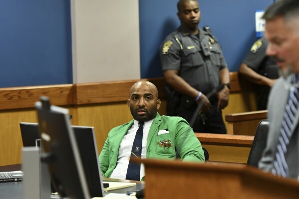 Defendant Harrison Floyd, a leader in the organization Black Voices for Trump, appears during a hearing related to the Georgia election indictments, Tuesday, Nov. 21, 2023, in Atlanta. Fulton County Superior Court Judge Scott McAfee heard arguments Tuesday on a request to revoke Floyd's bond, of one of former President Donald Trump's co-defendants in the Georgia case related to efforts to overturn the 2020 election. Fulton County District Attorney Fani Willis, in a motion filed last week, says that Floyd has been attempting to intimidate and contact likely witnesses and his co-defendants in violation of the terms of his release. (Dennis Byron/Hip Hop Enquirer via AP)