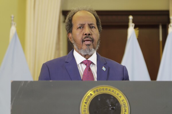 Somalia President Hassan Sheikh Mohamud addresses members of parliament in Mogadishu, Somalia, Wednesday, Feb 21, 2024. Somalia announced a defense deal with Turkey to deter Ethiopia's access to sea through a breakaway region. Ethiopia signed a memorandum of understanding with Somaliland on Jan. 1. The document has rattled Somalia, which said it's prepared to go to war over it because it considers Somaliland part of its territory. (AP Photo/Farah Abdi Warsameh)