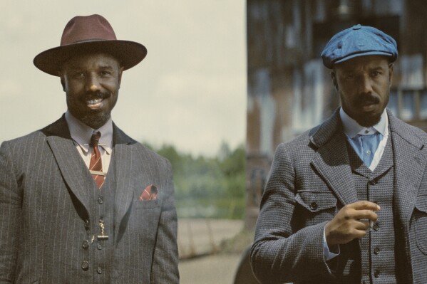 This image released by Warner Bros Pictures shows Michael B. Jordan portraying two characters in a scene from "Sinners." (Warner Bros. Pictures via AP)