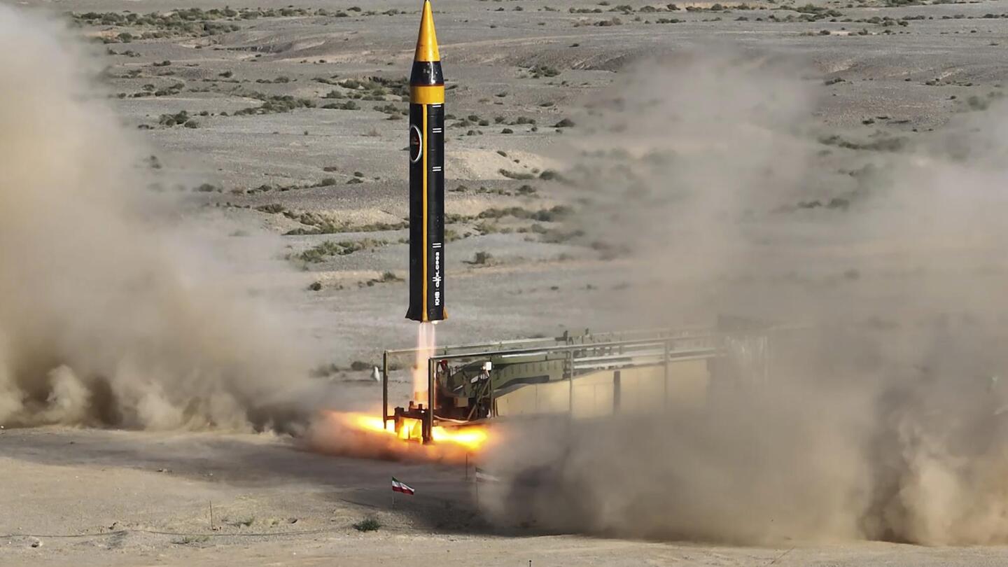 Iran Unveils Latest Version Of Ballistic Missile Amid Wider Tensions Over Nuclear Program Ap News 4602