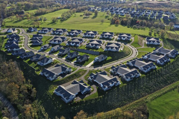 File - A development of new homes is shown in Middlesex Township, Pa., on Apr. 19, 2023. The U.S. economy and job market largely avoided painful fallout in 2023 from the Federal Reserve's relentless campaign against inflation but American real estate took a big hit. (AP Photo/Gene J. Puskar, File)