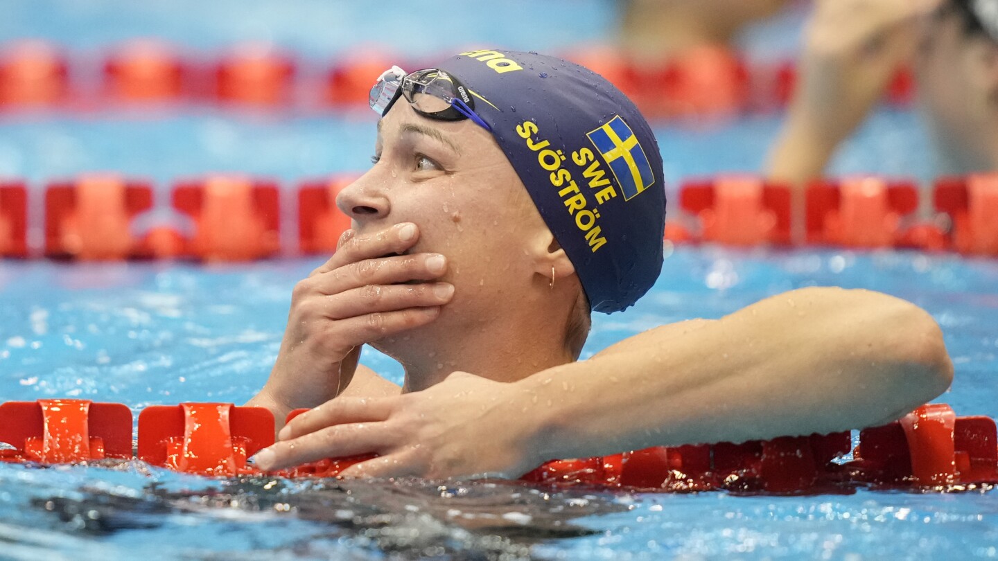 Swedish swimmer Sarah Sjoestroem breaks her own world record in the 50