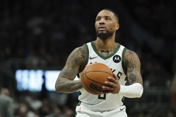 Bucks' Damian Lillard feeling grateful as he gets closer to joining his  teammates in playoffs | AP News