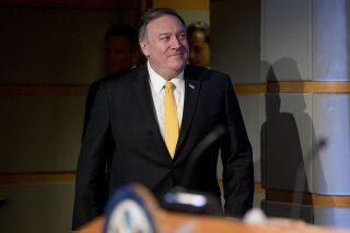 
              Secretary of State Mike Pompeo arrives for a news conference at the State Department in Washington, Friday, Feb. 1, 2019. Secretary of State Mike Pompeo has announced that the U.S. is pulling out of a treaty with Russia that's been a centerpiece of arms control since the Cold War. (AP Photo/Andrew Harnik)
            
