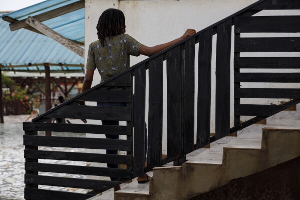 Efua, a 25-year-old fashion designer and single mother in Ghana who became pregnant in 2023, poses for a photo in Accra, Ghana, Tuesday, March 19, 2024. (AP Photo/Misper Apawu)
