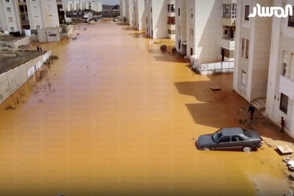 CORRECTS THE NAME OF THE STORM TO DANIEL - Streets a flooded after storm Daniel in Marj, Libya, Monday, Sept. 11, 2023. The head of one of Libyas rival governments says that 2,000 people are feared dead in flooding that swept through the eastern parts of the north African nation. (Libya Almasar TV via AP)