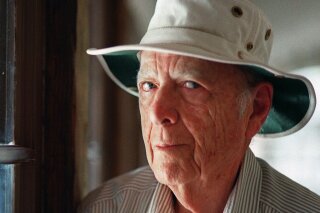 
              FILE - This May 15, 2000, file photo, shows Pulitzer Prize-winning author Herman Wouk in Palm Springs, Calif. Wouk died in his sleep early Friday, May 17, 2019, according to his literary agent Amy Rennert. He was 103. (AP Photo/Douglas L. Benc Jr., File)
            