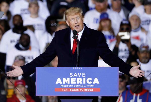 FILE - Former President Donald Trump speaks at a rally, Saturday, Jan. 29, 2022, in Conroe, Texas.  Trump is endorsing Mehmet Oz in Pennsylvania’s crowded Senate primary, ending months of jockeying for Trump's support. Trump says in a statement that his decision is “all about winning elections” as he backs the celebrity heart surgeon best known as the host of daytime TV’s “The Dr. Oz Show.” Trump had previously endorsed Sean Parnell in the race, but Parnell withdrew amid allegations of abuse from his estranged wife.  (Jason Fochtman/Houston Chronicle via AP, File)