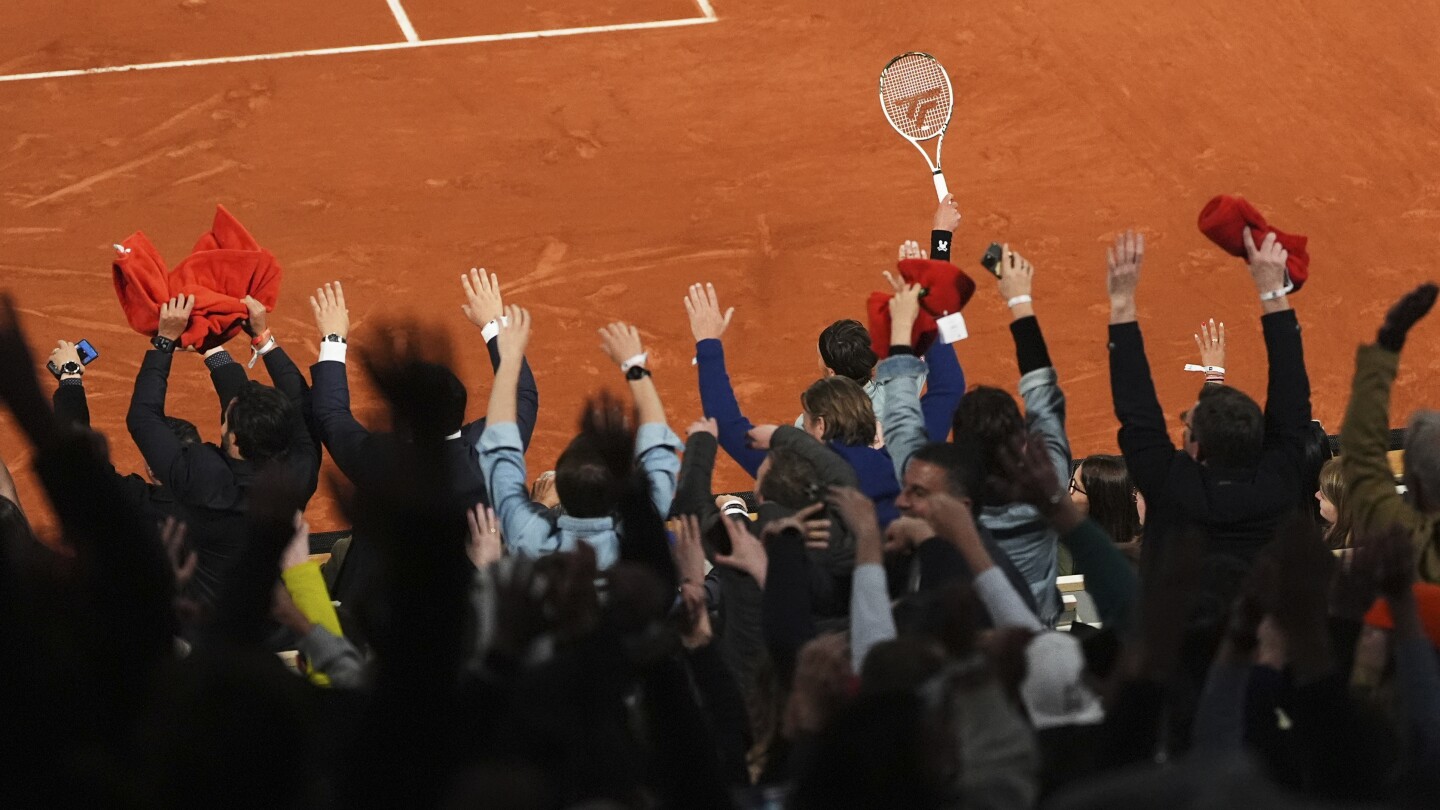 Opponents of French players at the French Open deal with insults and whistling and, yes, even gum