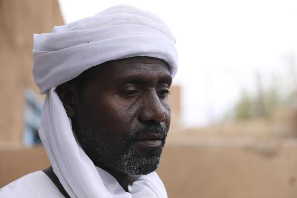 Abdullah Jaber, whose son Mubarak died in a migrant ship sinking last month, sits at his home in Khartoum, Sudan,  Friday, April 30 2021. When more than 100 Africans hoping to reach Europe on a rubber boat called repeatedly for help in late April, a rescue never came. In all, approximately 130 people are believed to have died off the Libyan coast. It was the deadliest wreck so far this year in the Mediterranean Sea and has renewed accusations that European countries are failing to help migrant boats in trouble. (AP Photo/Marwan Ali)