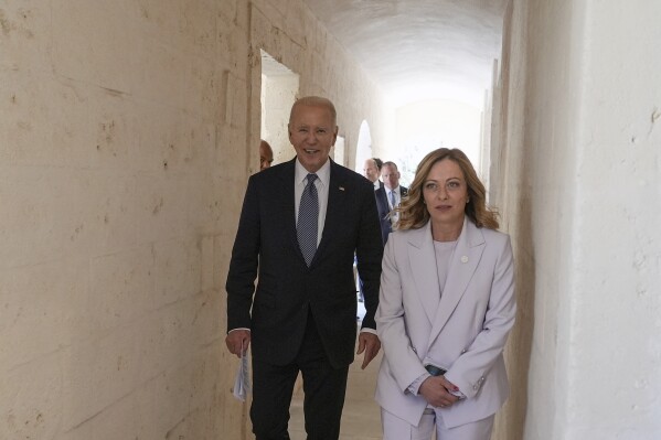 U.S. President Joe Biden and Italian Prime Minister Giorgia Meloni arrive for bilateral talks at the G7, Friday, June 14, 2024, in Borgo Egnazia, near Bari, southern Italy. (AP Photo/Alex Brandon)