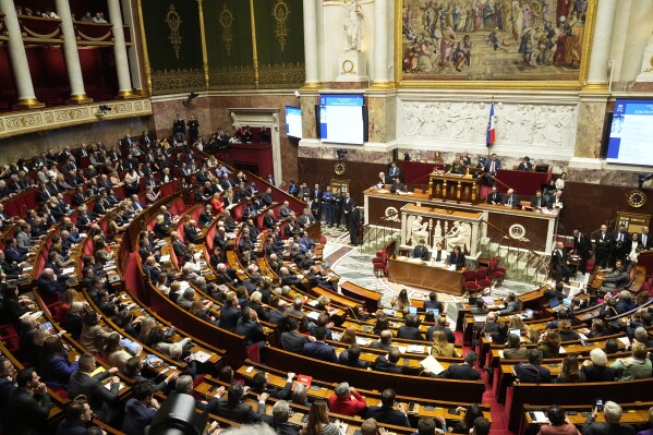 FILE - A general view of National Assembly in Paris, Monday, Dec. 11, 2023. French lawmaker Sandrine Josso, 48, made Tuesday Jan.16, 2024 a striking, much-applauded come-back at the National Assembly after she accused a senator of having drugged her with the aim of sexual assault. (AP Photo/Michel Euler, File)