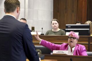 North Carolina state Rep. Allison Dahle, a Wake County Democrat, questions Nash County Republican Rep. Allen Chesser about a handgun access bill during a committee meeting at the Legislative Building in Raleigh, N.C., on Wednesday, Feb. 15, 2023. (AP Photo/Hannah Schoenbaum)