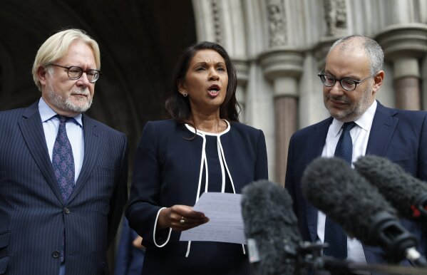 Anti Brexit campaigner Gina Miller speaks to the media outside the High Court in London, Friday, Sept. 6, 2019. The High Court  has rejected a claim that Prime Minister Boris Johnson is acting unlawfully in suspending Parliament for several weeks ahead of the country’s scheduled departure from the European Union. (AP Photo/Alastair Grant)