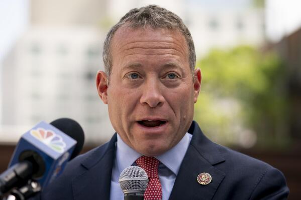 FILE - Rep. Josh Gottheimer, D-N.J., speaks during a news conference on Aug. 15, 2022, in New York. Progressive and centrist Democrats in the House have clinched agreement on a long-sought policing and public safety package that will be brought to the House floor just weeks before the midterm elections. The breakthrough came after intense negotiations in recent days between Gottheimer, a leader of the centrist coalition, and Rep. Ilhan Omar D-Minn., one of the leaders of the progressive faction. (AP Photo/John Minchillo, File)