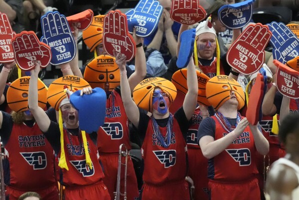 Dayton's band shows support for their team during the first half of a first-round college basketball game against Nevada in the NCAA Tournament in Salt Lake City, Thursday, March 21, 2024. (AP Photo/Rick Bowmer)